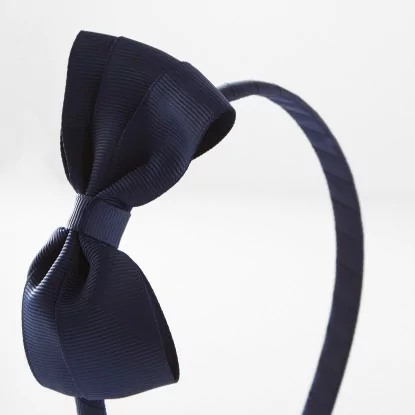 ربطة رأس مزينة بعقدة فيونكة