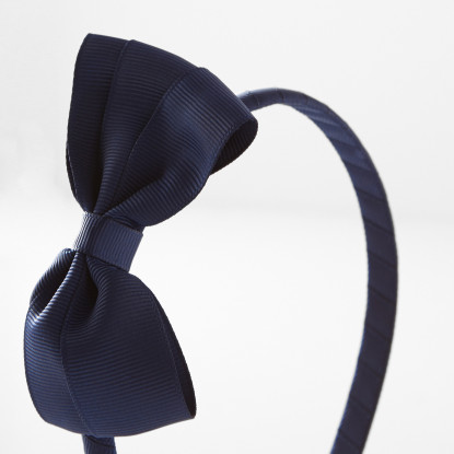 ربطة رأس مزينة بعقدة فيونكة